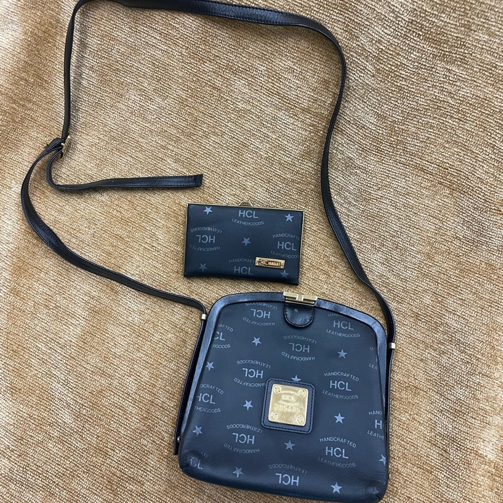 HCL crossbody/matching wallet. Black leather with gold accents